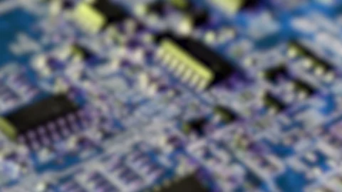 Detail of components on blue printed electronic circuit. Stock Footage 117059983