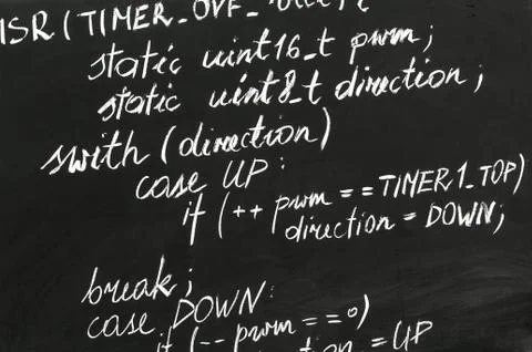 A detail of computer code in AVR explained with white chalk Stock-Fotos