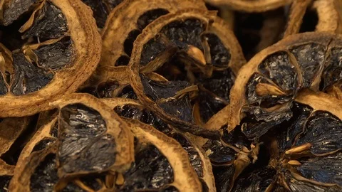 Detail of a container full of dried lemons Stock Footage 125932533