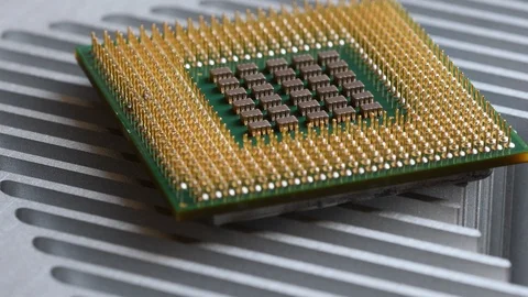 Detail of CPU Chip Processor over aluminum heatsink Stock Footage 106330597