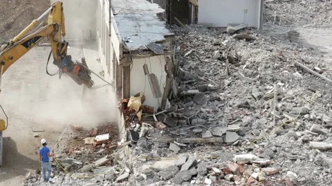Detail of a demolition grapple at work on a construction site   1 Stock-Footage 197044557