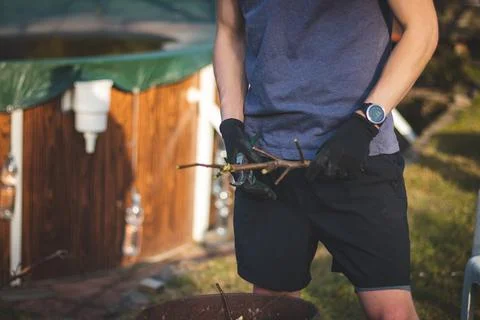 Detail of the deployment of a young temporary worker in a forest environment  Stock Photos