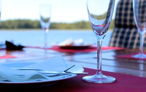 Detail of dinner table outside. Stock Photos
