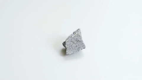 Detail of diorite over white background Stock Footage 142701038