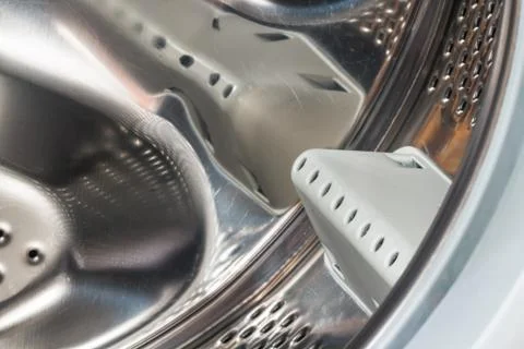 Detail of drum washing machine close-up Stock Photos