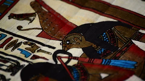 Detail of egyptian papyrus with pharaohs and hieroglyphics representation Stock Footage
