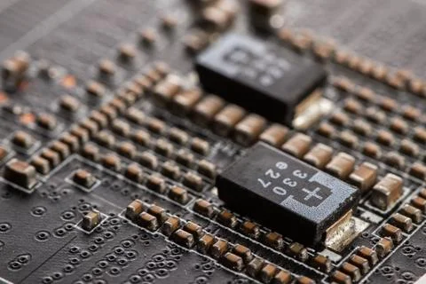 Detail of electronic components and microchips on a video card. Latest gene.. Stock Photos