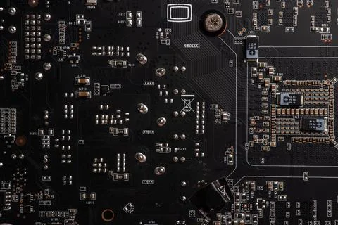 Detail of electronic components and microchips on a video card. Latest genera Stock Photos