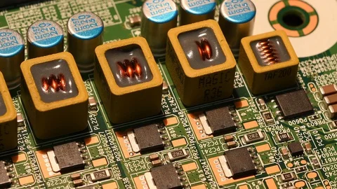 Detail on Electronic components on modern pc motherboard Stock Footage 127586380