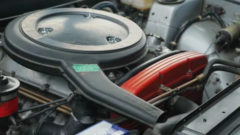 Detail of engine bay in classic car, Fiat 130, slow motion 50 fps Video stock 237137751