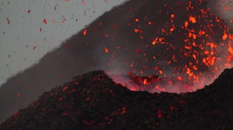 Detail explosion of lava from a vent at sunset 스톡 동영상 53844759