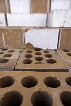 Detail of fired clay bricks to make walls, construction Stock Photos