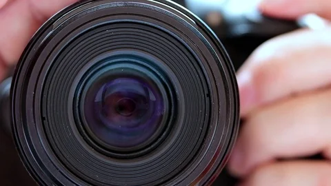 Detail of focus of the camera lens with press the shutter release button Stock Footage 87498203