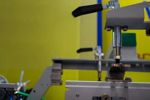 Detail of a folder gluer machine Stock Photos
