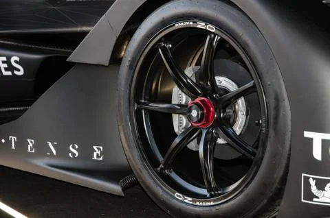 Detail of the front tire of a Formula E electric car. Stock Photos