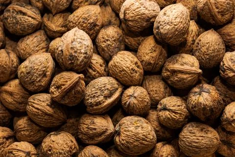 Detail full frame high angle view of pile of walnuts lying in box 스톡 사진