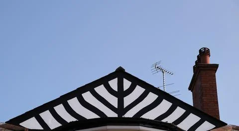 Detail of gable, the triangular section of wall at the end of a pitched roof Stock Photos