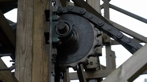 Detail of gear helping a rollercoaster to the highest point Stock Footage 126009282