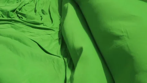Detail of green cloth flapping in the wind Stock Footage 76935841