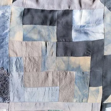 Detail of hand-crafted patchwork quilt Stock Photos