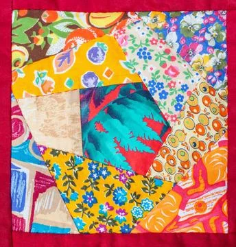 Detail of hand made patchwork quilt in red framing detail of hand made pat... Stock-Fotos