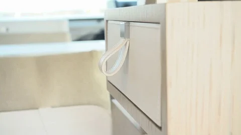 Detail of hand opening a drawer. Stock Footage 82001256