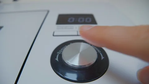 Detail Of A Hand Spin and Push The Microwave Button, Kitchen Appliance. 스톡 동영상 115604808