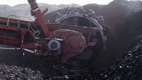 Detail of huge coal excavator mining wheel Stock Footage