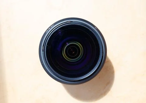 Detail lens glass on ocre background. Detail photos. Foto stock