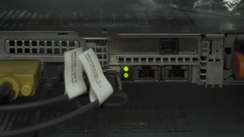 Detail of lights blinking cloud computing system on rack in server room Pan-l Stock Footage 141546644