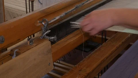 Detail of Loom work. Close up. Hands tied torn white thread 20 Stock-Footage 126960182
