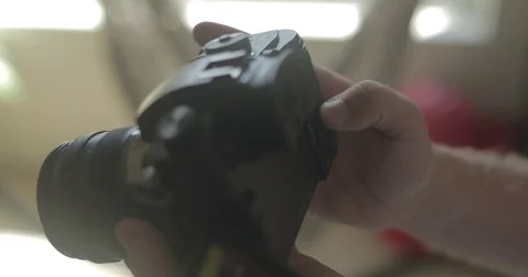 Detail of man using digital camera at home Video stock 78037724