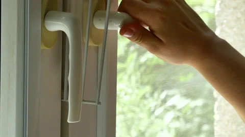 Detail Of A Man"s Hand Closing A Window, Side Shot Stock Footage 66460343