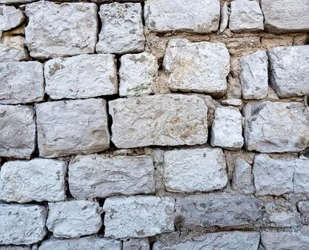 Detail of medieval stone castle wall background Stock Photos
