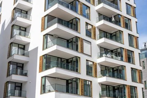 Detail of a modern white apartment building Stock Photos