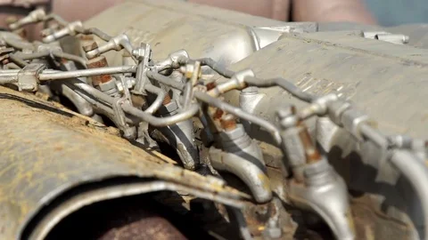 Detail of a motor of a ship. About engine, bolts, metal hose Stock Footage 71495809