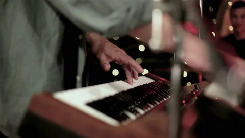 Detail of a musician's hands while playing the analogic shinth syntetyzator Stock Footage 163234910