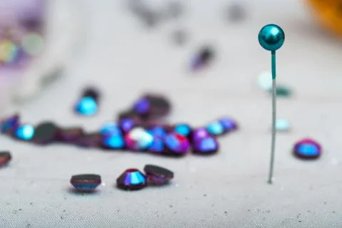 Detail of a needle with thread in the workroom tailor Stock Photos