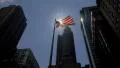 Detail of New York City with fluttering American flag 4k or 4k+ Resolution