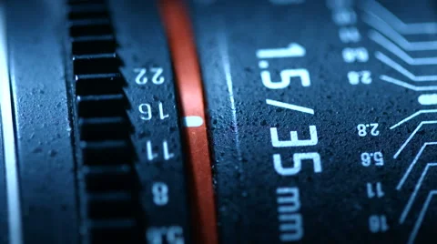 Detail of the objective moving aperture. Macro shot of the camera lens. Blackmag Stock Footage 64349892