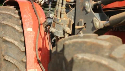 Detail of an old red tractor Stock Footage 10916906