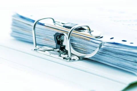 Detail of open folder filled with documents in cyan tone. Symbol of busine... 스톡 사진