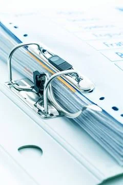 Detail of open folder filled with documents in cyan tone. Symbol of busine... 스톡 사진