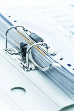 Detail of open folder filled with documents in cyan tone. Symbol of business or 스톡 사진