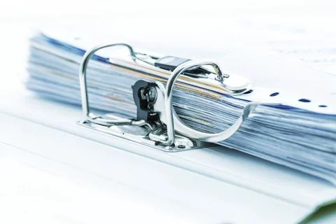 Detail of open folder filled with documents in cyan tone. Symbol of business or 스톡 사진