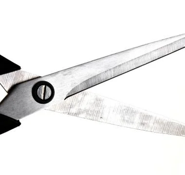 Detail of open scissors on white background Stock Photos