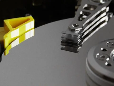 Detail from an opened hard disk Stock-Fotos