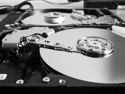 Detail from an opened hard disk Stock Photos