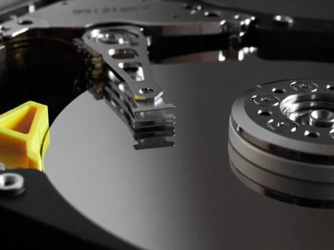 Detail from an opened hard disk Stock Photos
