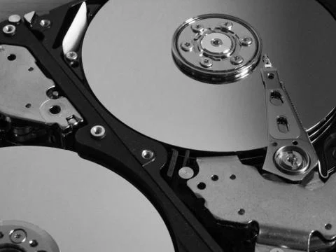 Detail from an opened hard disk Stock Photos